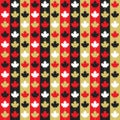 Red, black, white and golden trendy maple leaf icons set on stripy thick lines background pattern Royalty Free Stock Photo