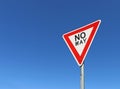 Red, black and white No Way road sign in a bright blue sky