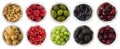 Red, black, yellow and green food. Fruits and berries in bowl isolated on white. Sweet and juicy berry with copy space for text. R Royalty Free Stock Photo