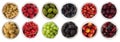 Red, black, yellow and green food. Fruits and berries in bowl isolated on white. Sweet and juicy berry with copy space for text. R Royalty Free Stock Photo