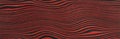 Red and Black Zebrano Exotic Wood Background Royalty Free Stock Photo