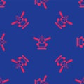 Red Blacksmith anvil tool and hammer icon isolated seamless pattern on blue background. Metal forging. Forge tool Royalty Free Stock Photo