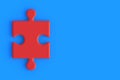 Red blank jigsaw puzzle piece on blue background. Copy space Royalty Free Stock Photo