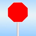 Red blank road Stop sign in blue sky background Royalty Free Stock Photo