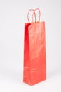 Red blank shopping bag for bootle mockup in grey background