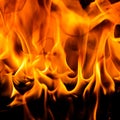 Red blaze Fire flame on a black background Royalty Free Stock Photo