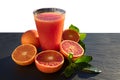 Red blood oranges juice on a slate plate Royalty Free Stock Photo