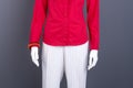 Red blouse and white trousers for women.