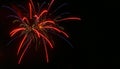 Red and blue arcs with gold arcs in center firework during the Fourth of July Royalty Free Stock Photo