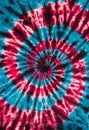 Red, Blue and Black Retro Abstract Psychedelic Tie Dye Swirl Design on cotton shirt. Royalty Free Stock Photo