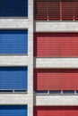 Red and blue blinds on the windows Royalty Free Stock Photo