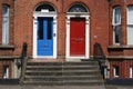 red and blue brick house door. A typical wooden door in Dublin. Ireland, Dublin 24.04.2023. Royalty Free Stock Photo