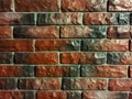 Red-blue brick wall covered with glossy lacquer with embroidery