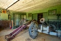 A Red and a Blue Cannon Inside an Old Building at Valley Forge National Historical Park