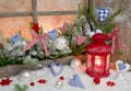 Red and blue Christmas decoration on window sill with hearts Royalty Free Stock Photo