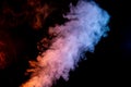 Plume of Red and Blue Smoke isolated on Black Background Royalty Free Stock Photo