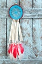 Dream catcher on shabby wooden background