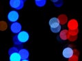 Red and blue decorative glowing blurred lights night background Royalty Free Stock Photo