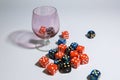The red and blue dice lie on a white background and are scattered in a chaotic manner Royalty Free Stock Photo