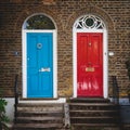 Red and Blue doors of a terrace Georgian house in London UK. Royalty Free Stock Photo