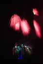 Red blue fireworks in Ostrava with city hall clock Royalty Free Stock Photo