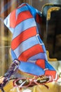 Red and blue foulard exposed in a boutique.