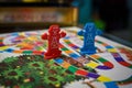 Red and Blue Game Pieces from a Board Game Royalty Free Stock Photo