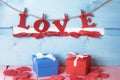 Red and blue gifts and word love Royalty Free Stock Photo