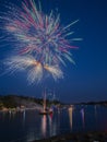 Fireworks over the water. Royalty Free Stock Photo