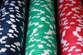 Red, blue, green, white and black poker chips columns Royalty Free Stock Photo