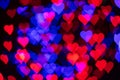 Red and blue hearts bokeh as background for Valentine's day Royalty Free Stock Photo