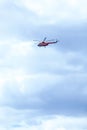 Red-Blue helicopter in flight Royalty Free Stock Photo