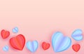 Red and blue Paper cut elements in shape of heart. flying on empty pink background. Royalty Free Stock Photo