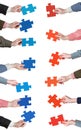 Red and blue puzzle pieces in people hands Royalty Free Stock Photo