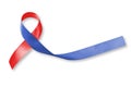 Red and Blue ribbon awareness on woman human hand aged wood for Congenital Heart Defects disease Royalty Free Stock Photo