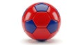 A red and blue soccer ball features a classic hexagonal and pentagonal pattern. Royalty Free Stock Photo