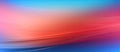 Red and blue swirl on blurred background resembling a sky afterglow