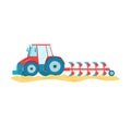 Red blue tractor plowing sandy field. Modern agriculture machine working farm. Farming equipment Royalty Free Stock Photo