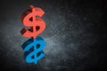 Red and Blue US Currency Symbol or Sign With Mirror Reflection on Dark Dusty Background
