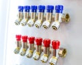 Red and blue valves closeup, pressure controllers