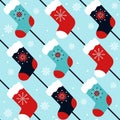 Red and blue vintage diagonal seamless pattern with christmas stockings and snowflakes Royalty Free Stock Photo