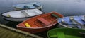 Colorful rustic weathered boats moored at the harbor
