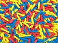 Red blue and yellow candy sprinkles