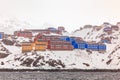 Red, blue and yellow living houses on the rocky hills of Sisimiut the 2nd largest Greenlandic city