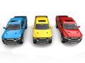 Red, blue and yellow modern pick-up trucks - top down front view Royalty Free Stock Photo