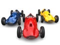 Red, blue and yellow old school vintage sports cars racing Royalty Free Stock Photo