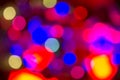 Red, blue, yellow and purple holiday bokeh. Abstract Christmas background Royalty Free Stock Photo