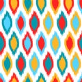 Red blue yellow and white colorful ikat asian traditional fabric seamless pattern, vector