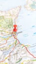 A red board pin stuck in Catania on a map of Sicily portrait Royalty Free Stock Photo