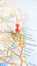 A red board pin stuck in Newcastle Upon Tyne on a map of England portrait Royalty Free Stock Photo